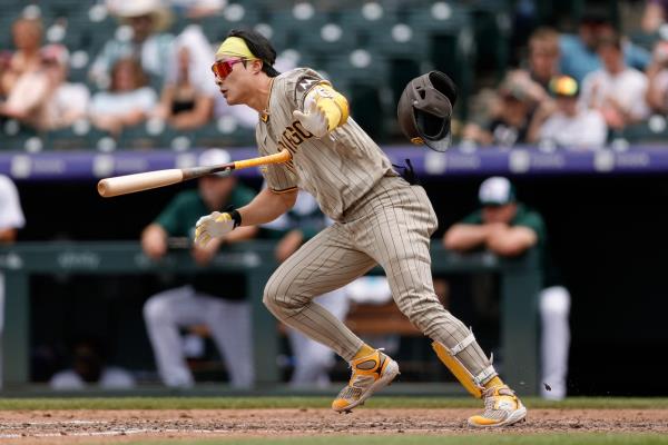 Kim Ha-seong of the San Diego Padres hits a single against the Colorado Rockies during the top of the fifth inning of a Major League baseball regular season game at Coors Field in Denver on Tuesday. (Reuters)