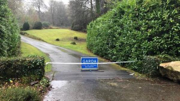 Gardai investigate fire at the Ross Lake House Hotel, which had been due to accommodate asylum seeks. Picture: MWI